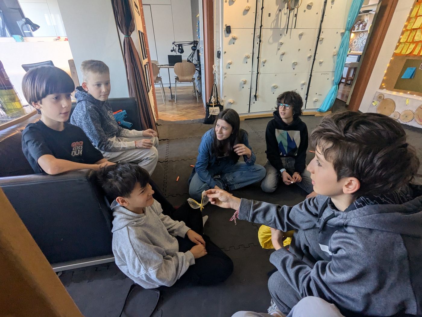 Children using different tools and roles inside the TwoFish environment.