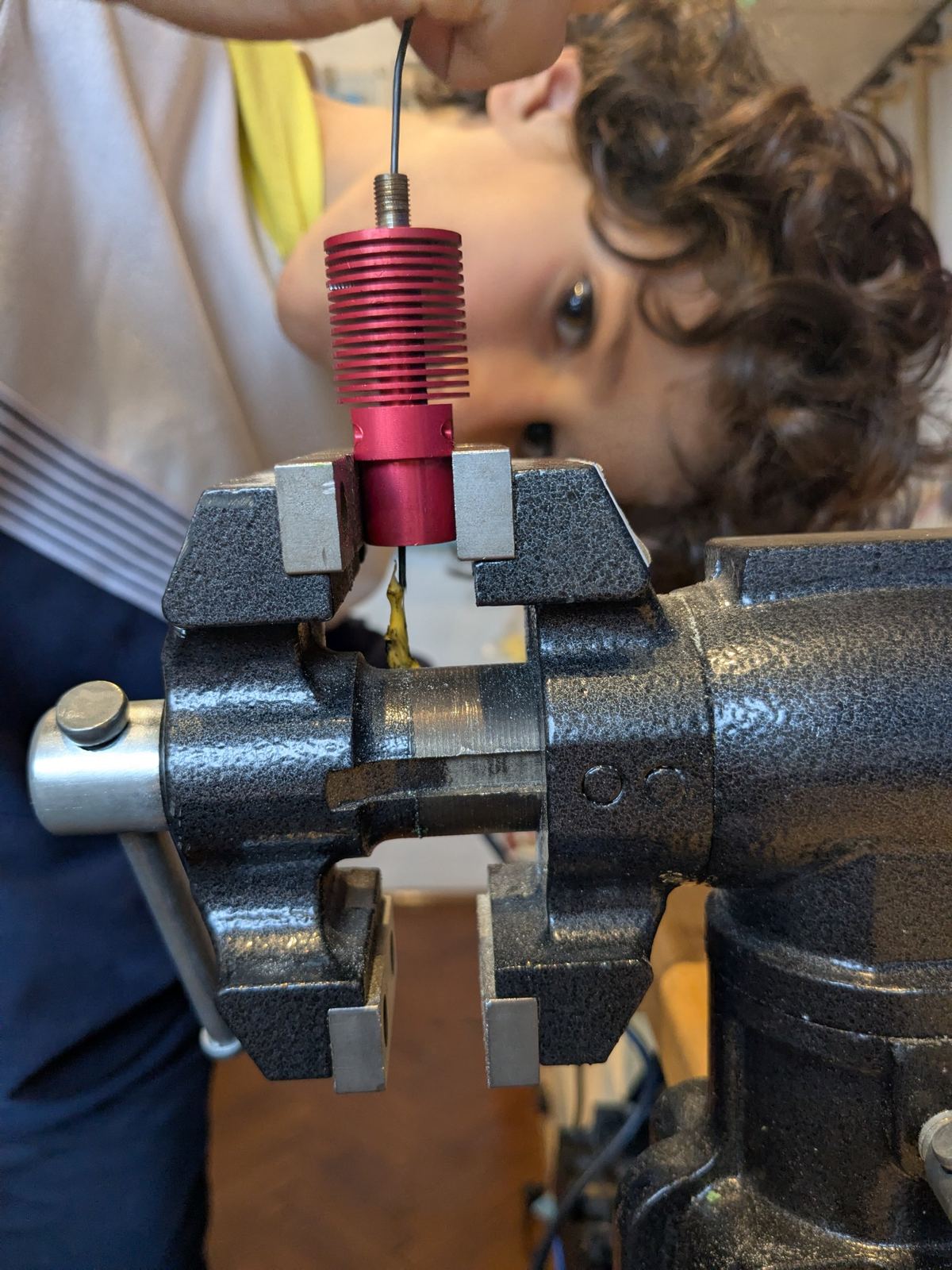 A warm TwoFish image showing a child engaged, focused, and supported.